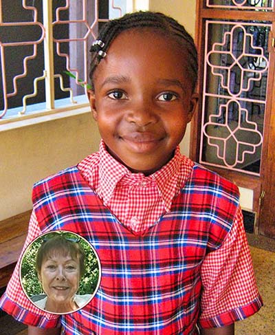 Sophia als Kind in Schuluniform — Patenkind von Planet Children